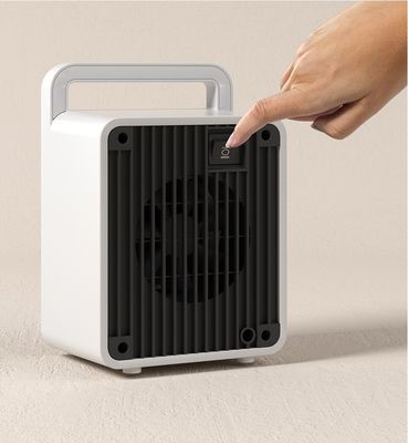 Mini calentador eléctrico portátil PTC Calentamiento rápido para el hogar y la oficina Fuente de energía de 900W