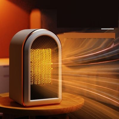 Escritorio 1200W Calentamiento rápido PTC Pies electrónicos pequeños Household calentador de espacio personal